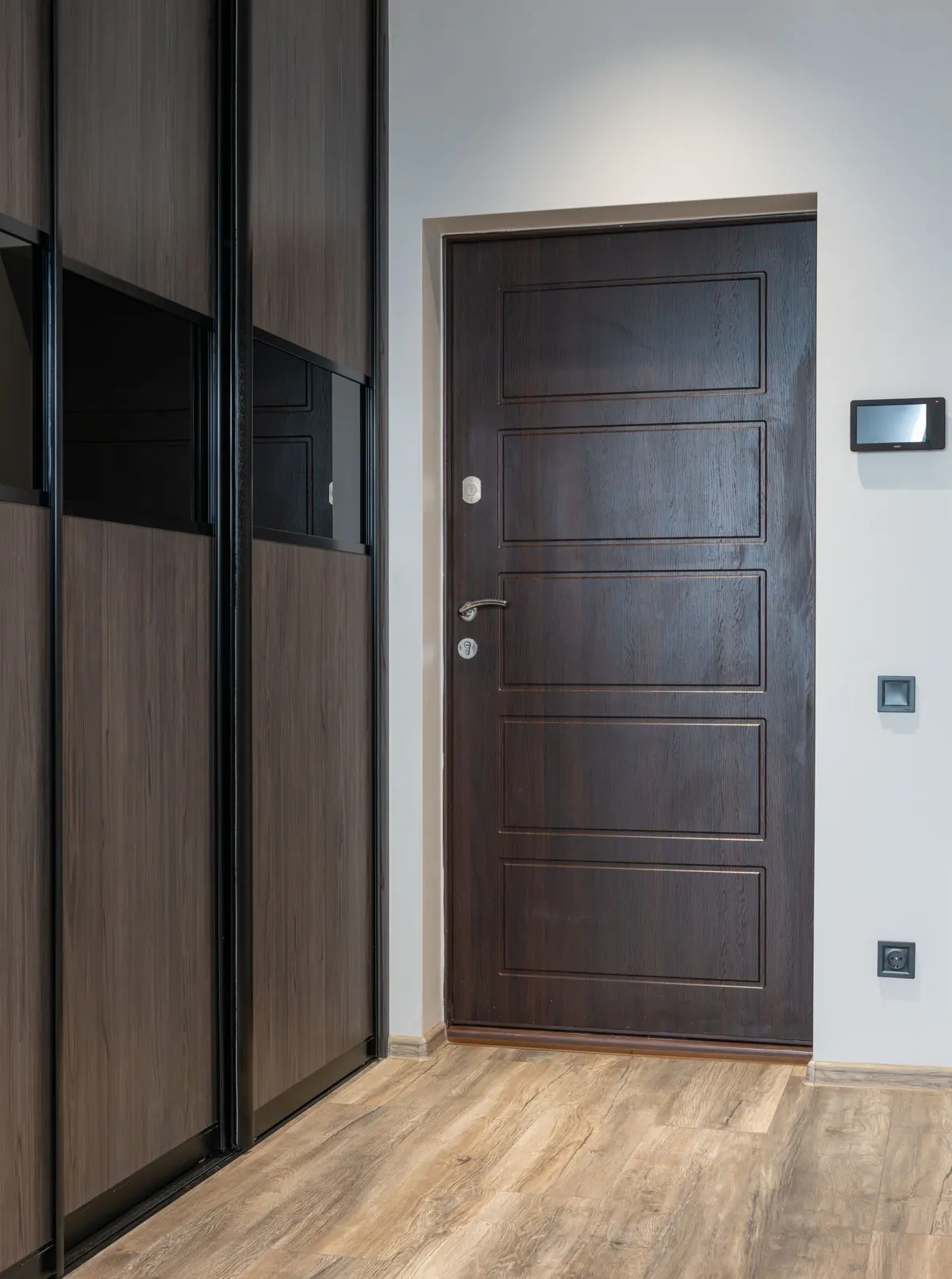 Contemporary laminate flooring in a closet