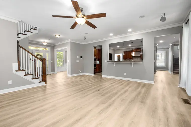 Spacious luxury vinyl plank flooring in a living room