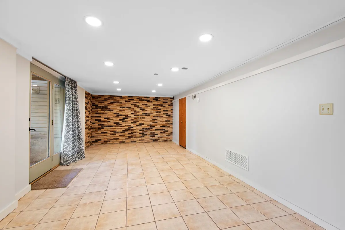 Bright tile flooring in a basement